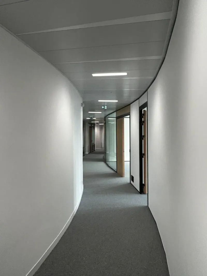 Curved corridor inside the Paris campus